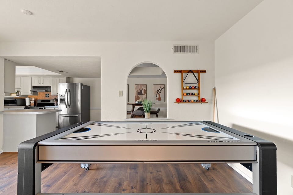Vibrant game room filled with entertainment options, perfect for fun and friendly competition.
