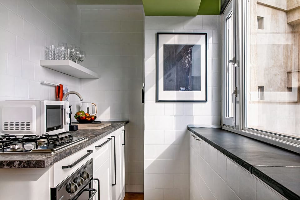 Apartment | Private kitchen | Full-size fridge, coffee/tea maker, electric kettle