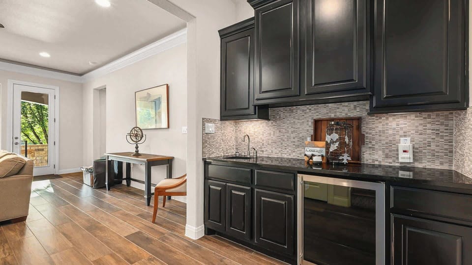 Head downstairs to access the secondary living area.