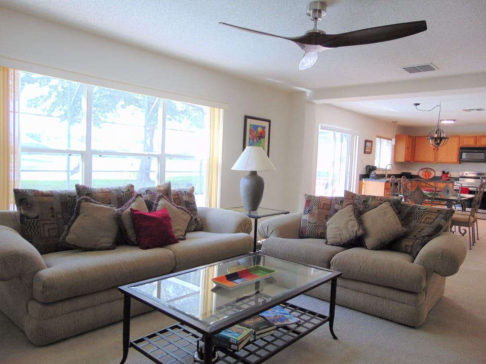 Our living room & kitchen feature an open floor plan perfect for large groups.