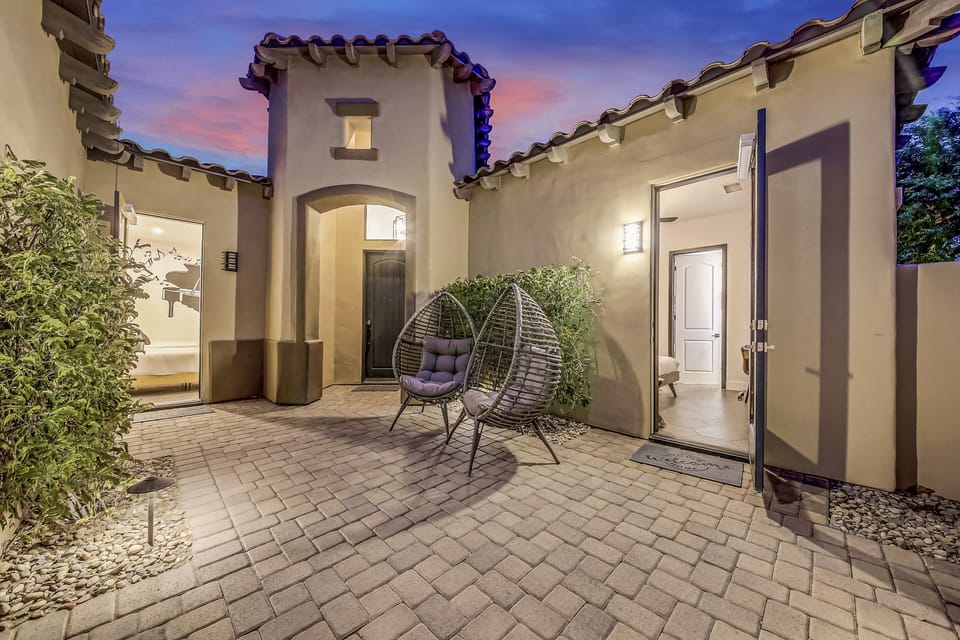 Large courtyard has seating for 2 and access to the attached casita and bedrooms 1 & 2