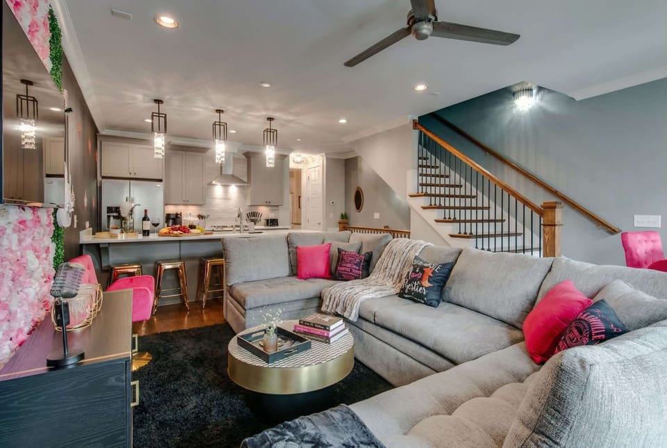 Discover a stylish Nashville vacation home that blends chic decor with cozy comfort. Perfect for large groups or bachelorette parties, this luxurious retreat offers an open layout for gathering, along with upscale amenities for an unforgettable stay.