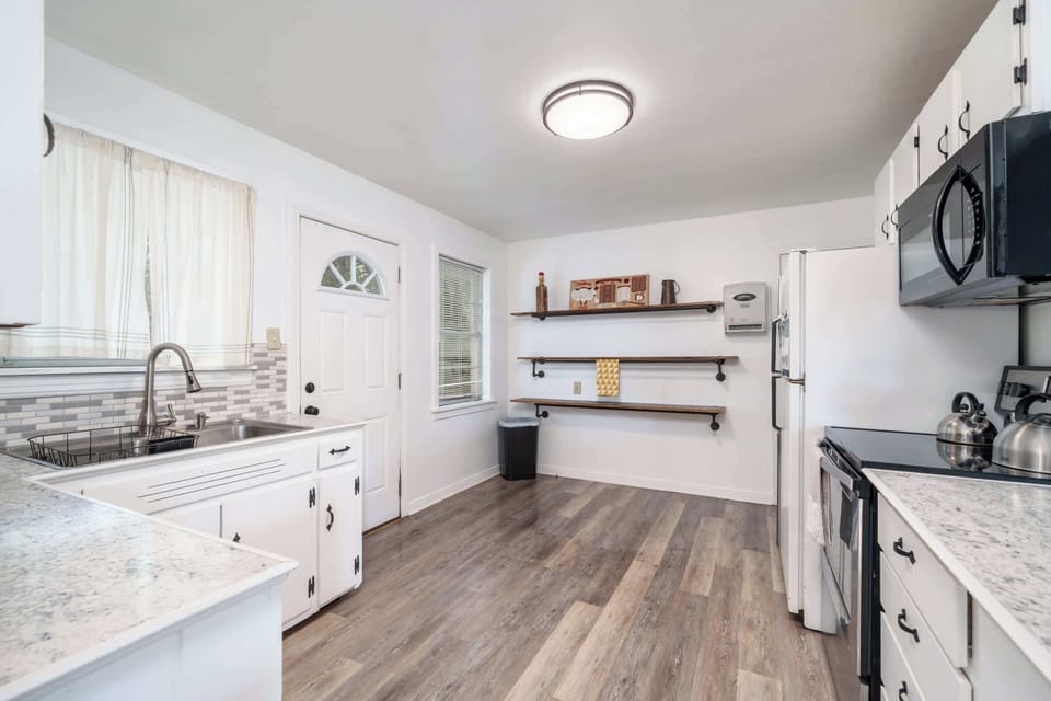 Very spacious kitchen, with lots of storage. Direct access to outdoors to grill, or sit on the patio to enjoy and relax outdoors.