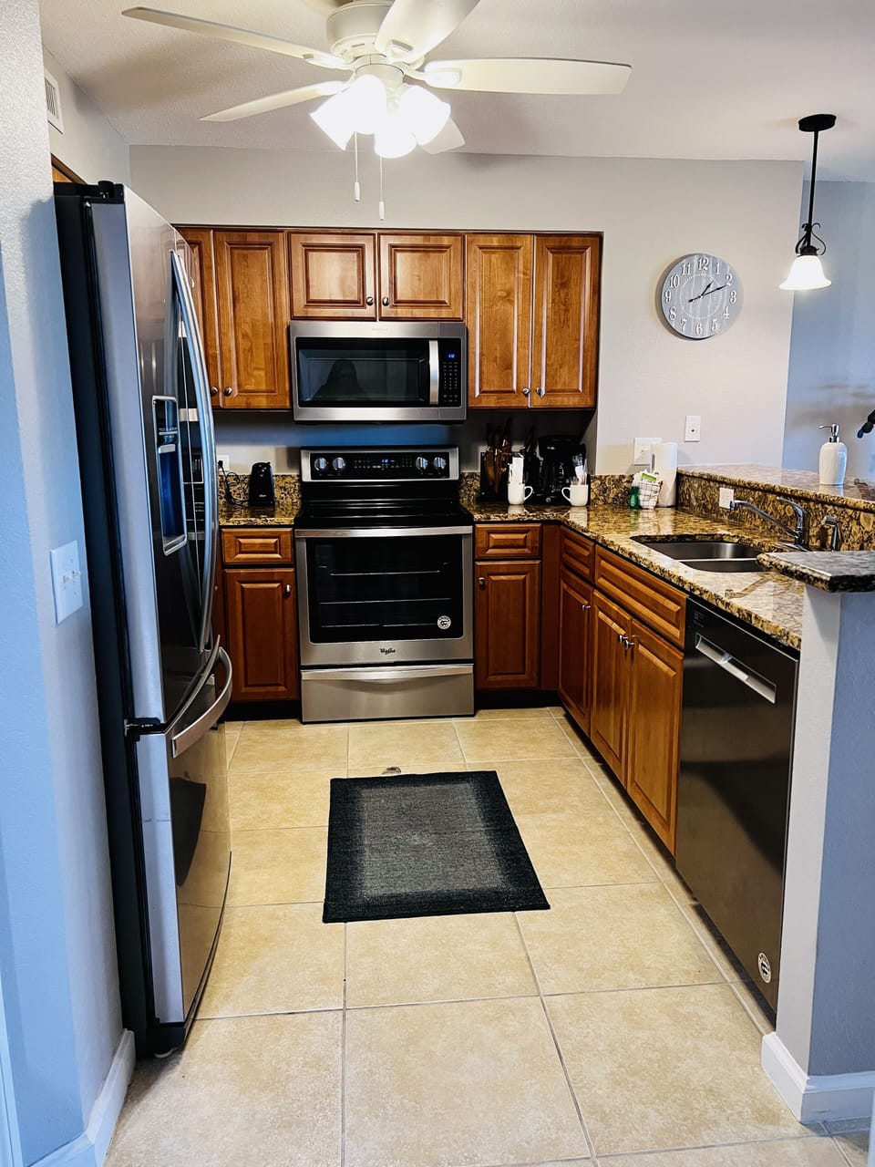 Your fully equipped kitchen awaits with granite counters, stainless appliances, and everything you need to create memorable meals together.
