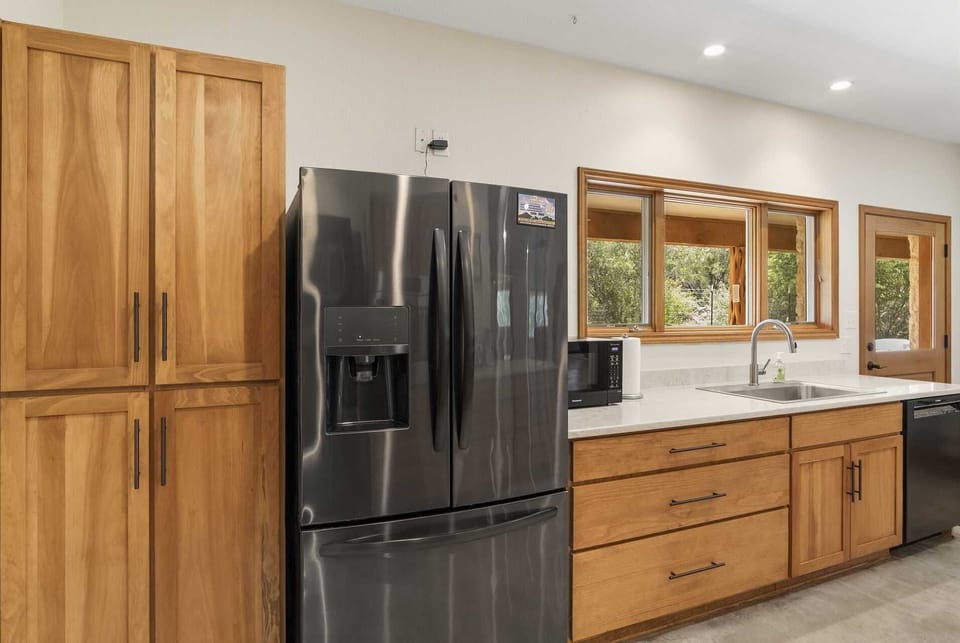 The kitchen, as well as the rest of the house at Roadrunner Canyon Ranch, is completely compliant with ADA accessibility standards.