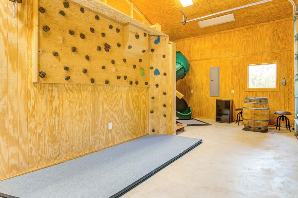 A challenging but fun rock wall is just one feature of the indoor play space designed specially for kids!