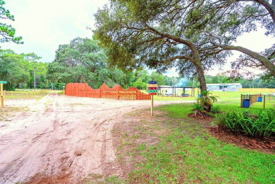 The Moto Ranch at Croom Vacation rentals main gate entrance 5 acres of private property inside Croom motorcycle area