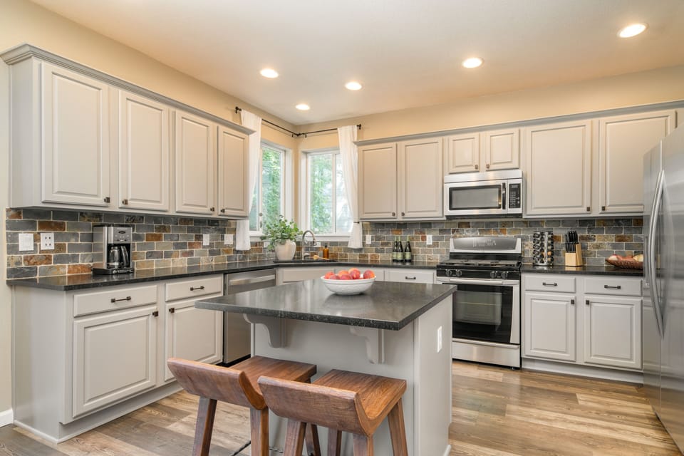 Additional seating at the island counter.