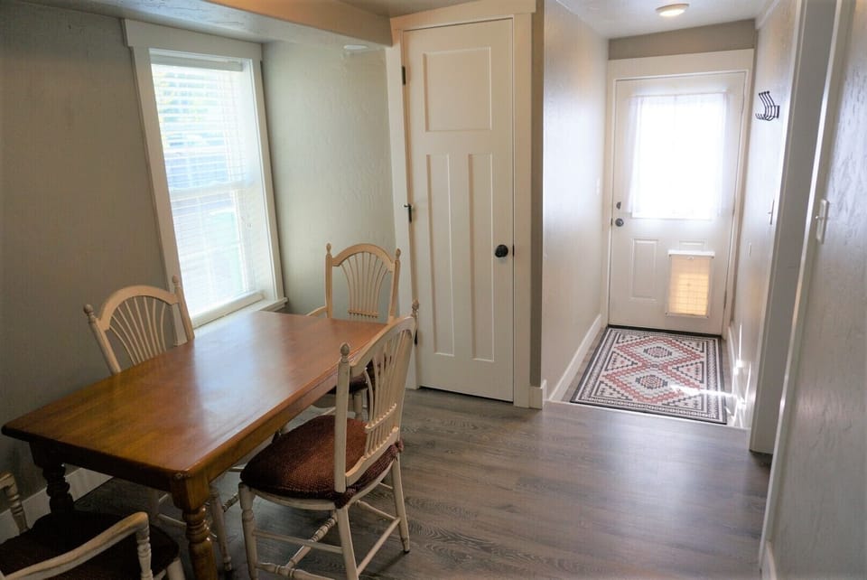Dining room and side entrance to fenced patio