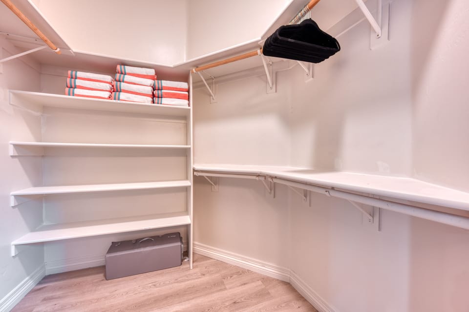 Master closet is stocked with pool towels and a pack n play for smaller guests. 
