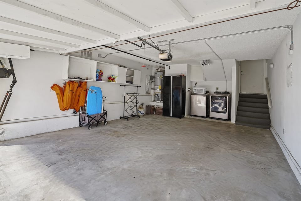 Garage: Laundry facilities and beach gear in the garage