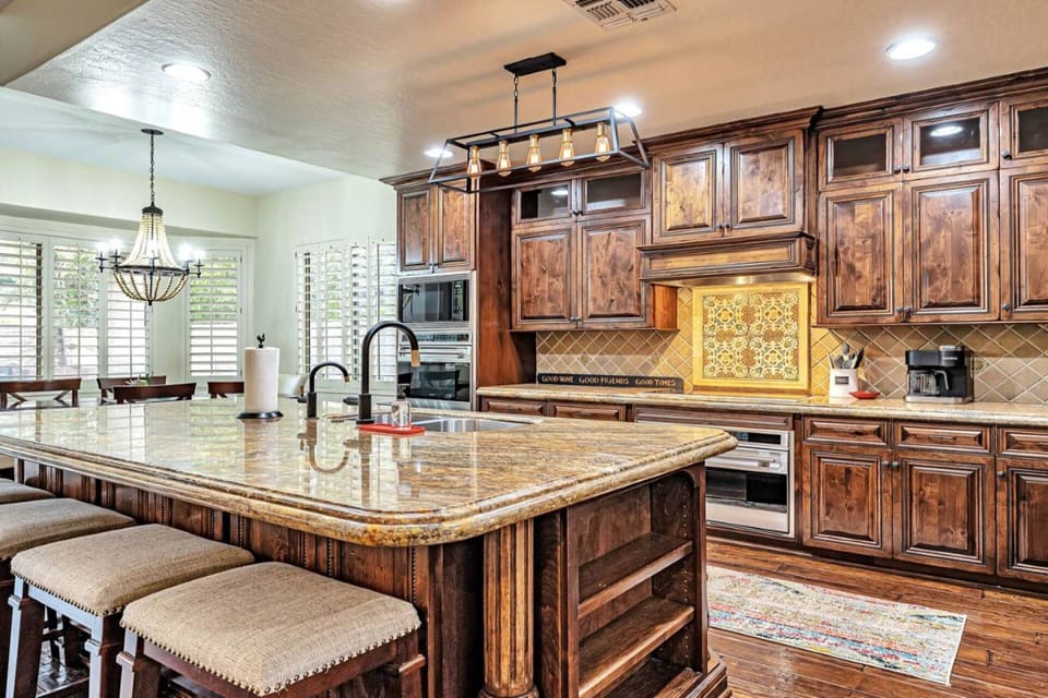 Spacious kitchen featuring large island and 4 bar stools