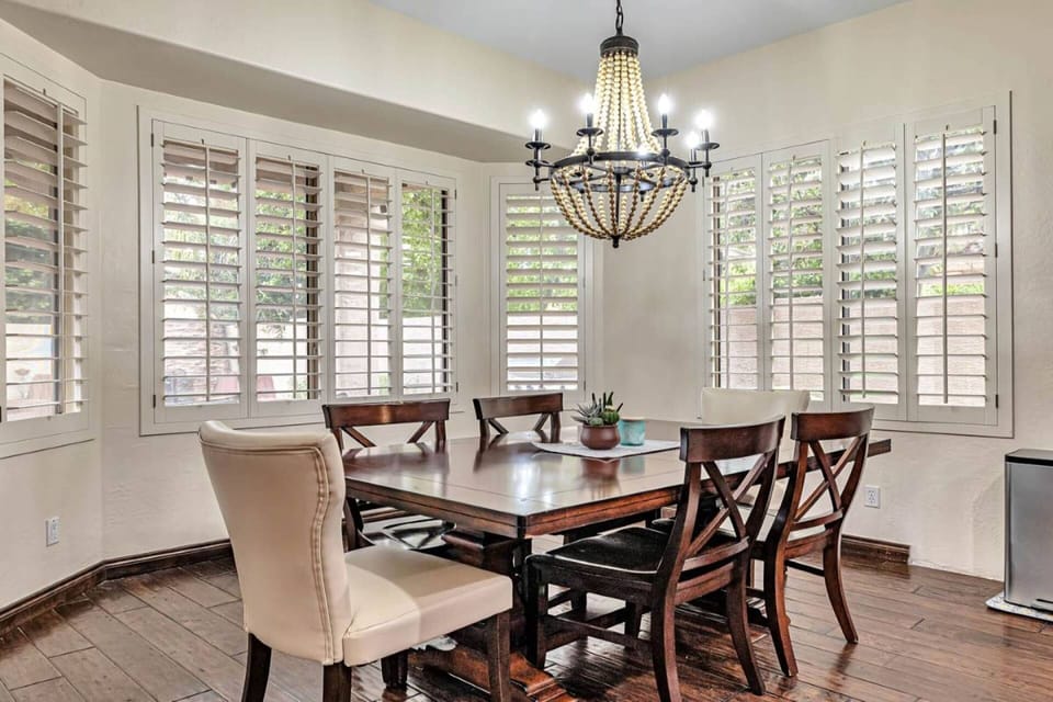 Kitchen table seating for 6 plus 4 barstools at the island