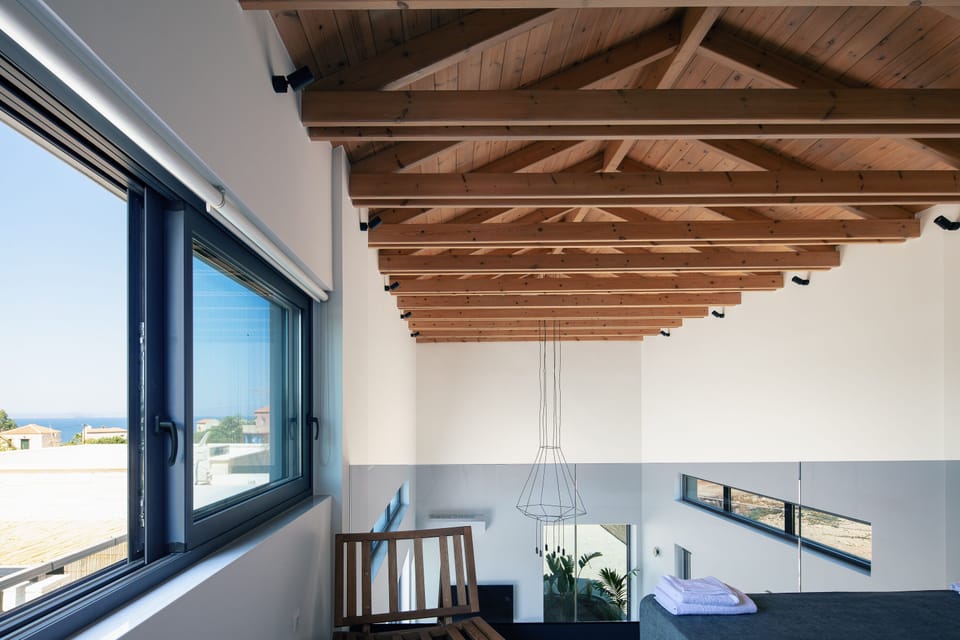 Attic overlooking the living room, offering extra space and views.