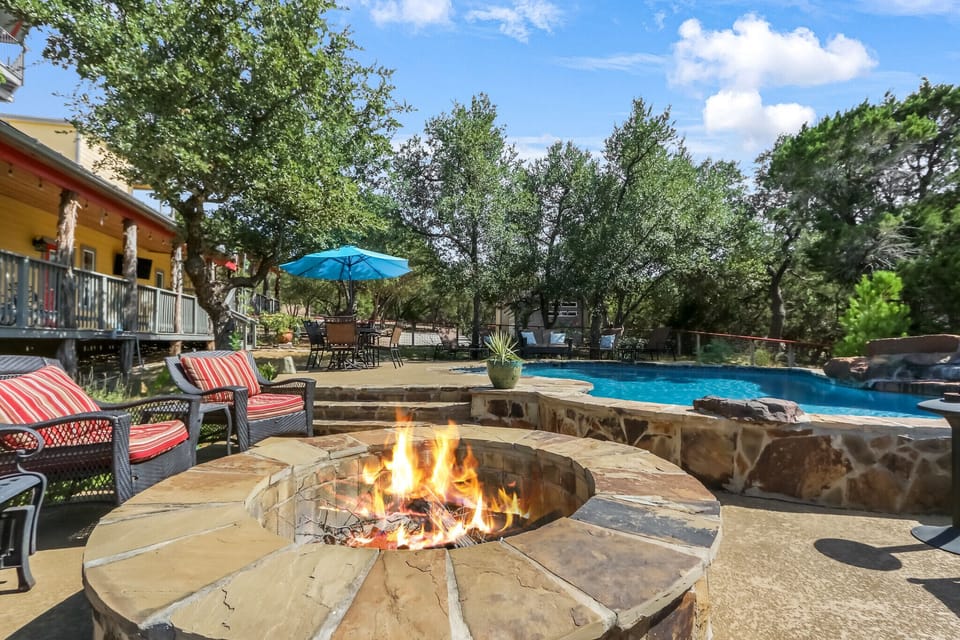 Enjoy company around the stone firepit