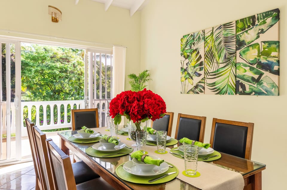 Dining Room with ceiling fan & patio