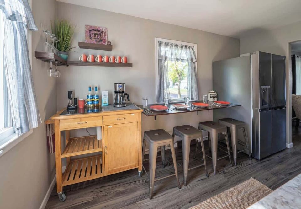 Kitchen with coffee bar and eat in dining area for four people. 