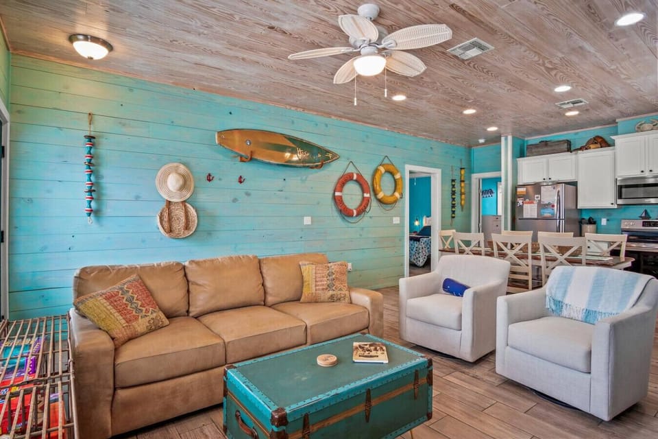 Charming coastal lounge – where comfort meets seaside character.