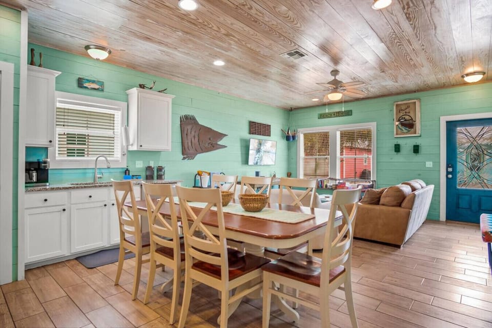 Cook, dine, and unwind together in this bright open-concept space.