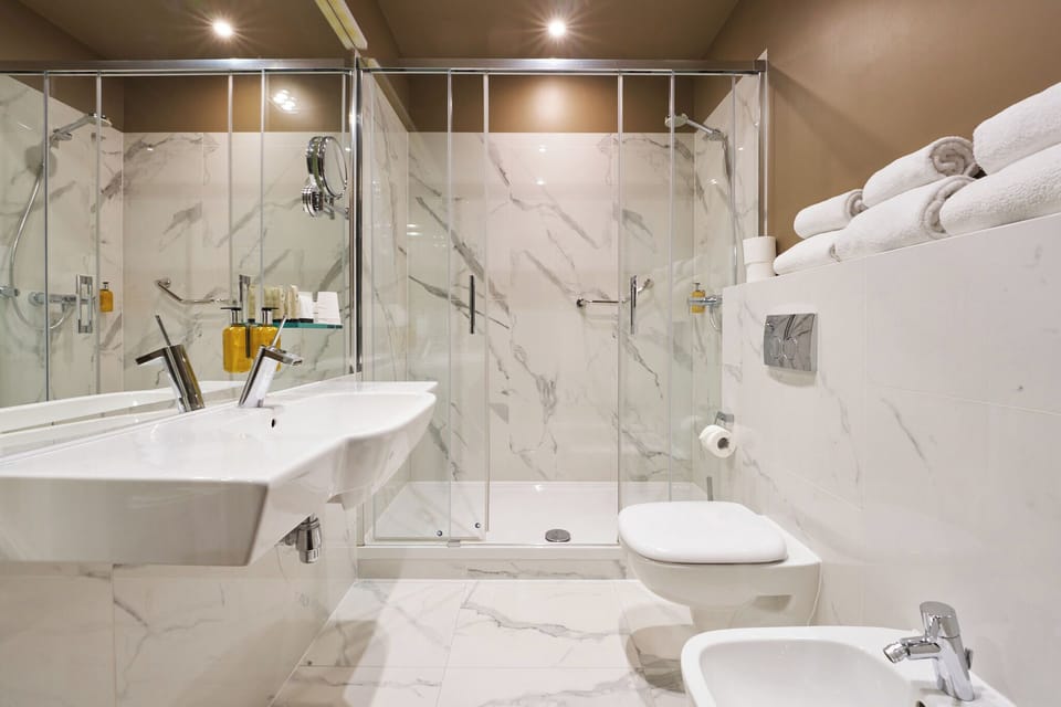Shower, free toiletries, hair dryer, bathrobes