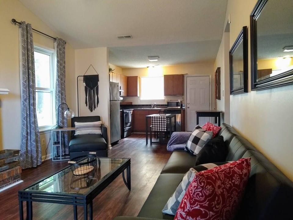Stretch out and relax in our expansive living room, perfect for family gatherings or a quiet evening alone.