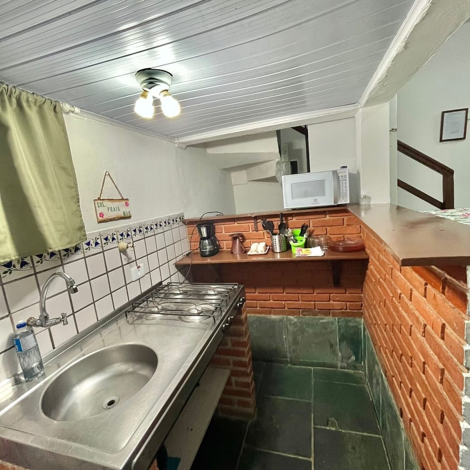Fridge, microwave, cookware/dishes/utensils