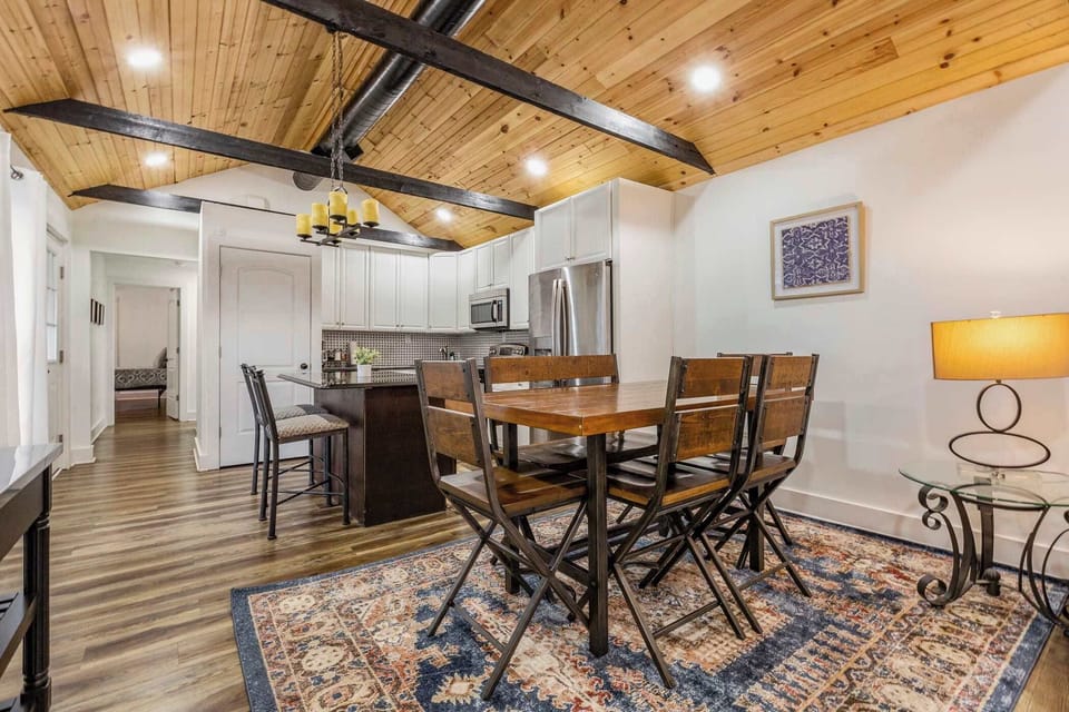 Spacious open layout connects dining, kitchen, and living areas.