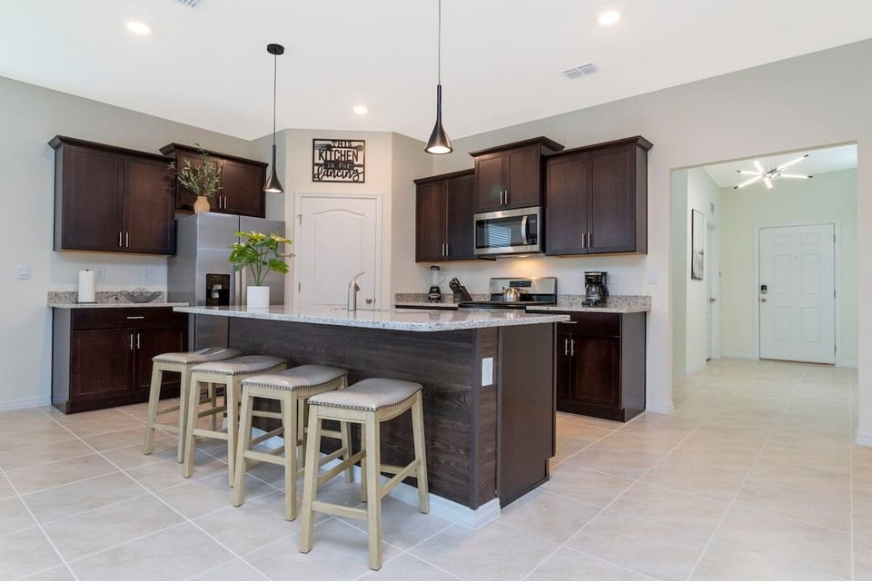 Fall in love for modern luxury with our stunning open kitchen—a beautiful, vibrant space that seamlessly combines style and functionality. a family-friendly retreat where the joy of cooking meets the warmth of togetherness.