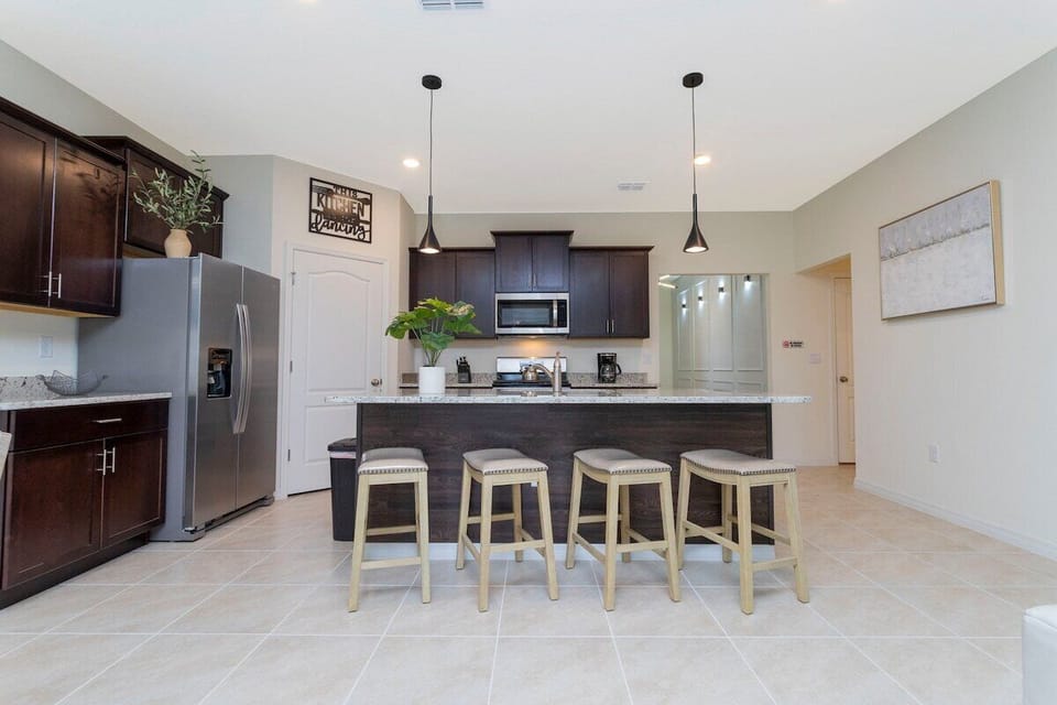 Fall in love for modern luxury with our stunning open kitchen—a beautiful, vibrant space that seamlessly combines style and functionality. a family-friendly retreat where the joy of cooking meets the warmth of togetherness.