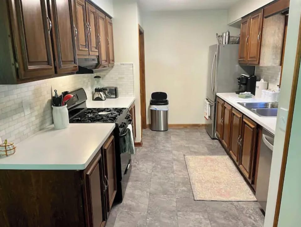 Well stocked kitchen with Keurig and drip coffee pot 