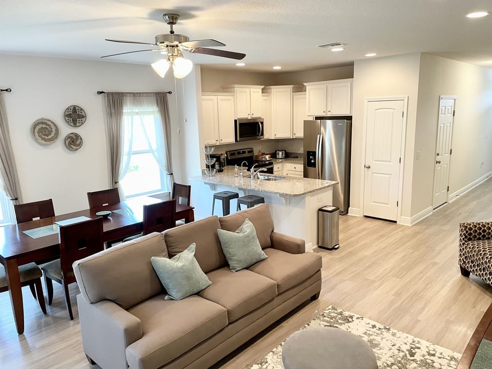 Living room/dining room/kitchen …open concept with 14 foot ceilings