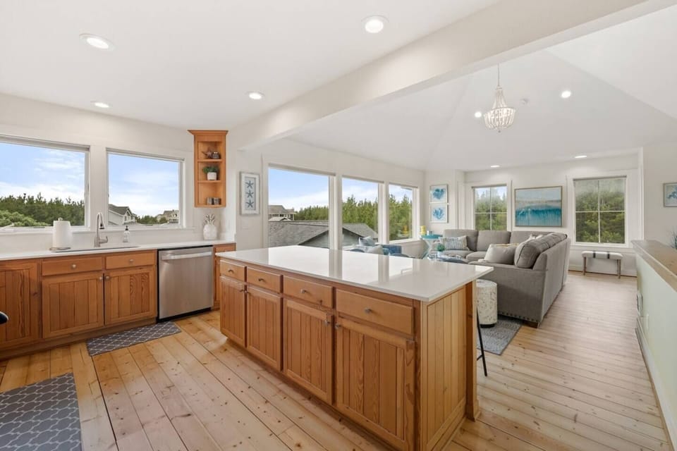 Socialize while cooking and a view of the ocean!
