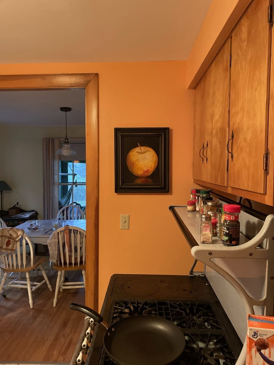 Kitchen looking into dining/puzzle area