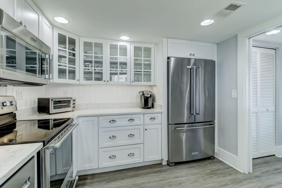 Sparkling Fully Equipped Kitchen with Quartz Countertops and Stainless Appliances
