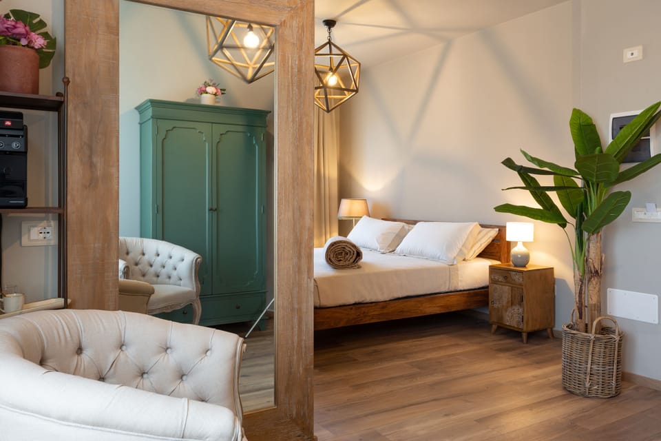 Classic Double Room | Minibar, in-room safe, iron/ironing board, free WiFi