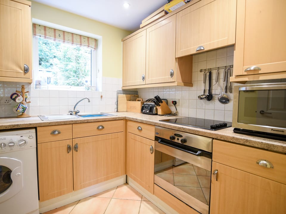 Fridge, electric kettle, cookware/dishes/utensils