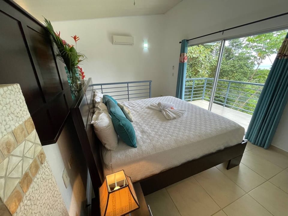 Owner's Suite has king-size bed, en suite bathroom, private balcony. 