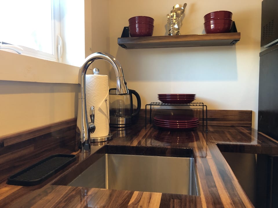 Suite, Private Bathroom (Efficiency Apartment) | Iron/ironing board (on request), WiFi (free), bed sheets