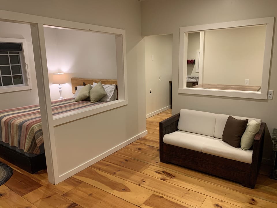 Suite, Private Bathroom (Efficiency Apartment) | Iron/ironing board (on request), WiFi (free), bed sheets