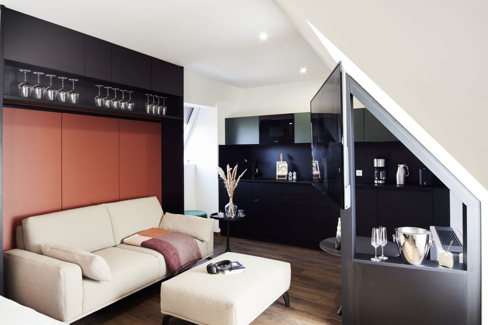 Superior Studio Suite | Living area | 65-inch Smart TV with satellite channels, TV, Netflix