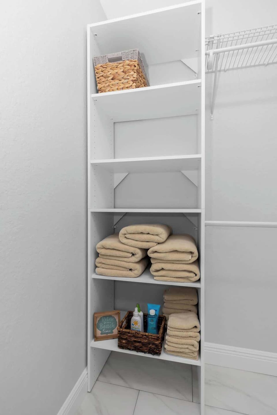 Main walk in closet/Bath and hand towels and wash cloths/Sunscreen and Aloe