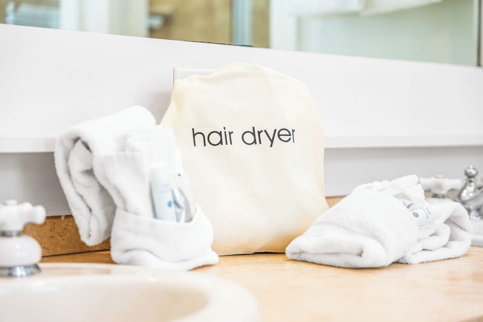 Hair Dryers Included!!