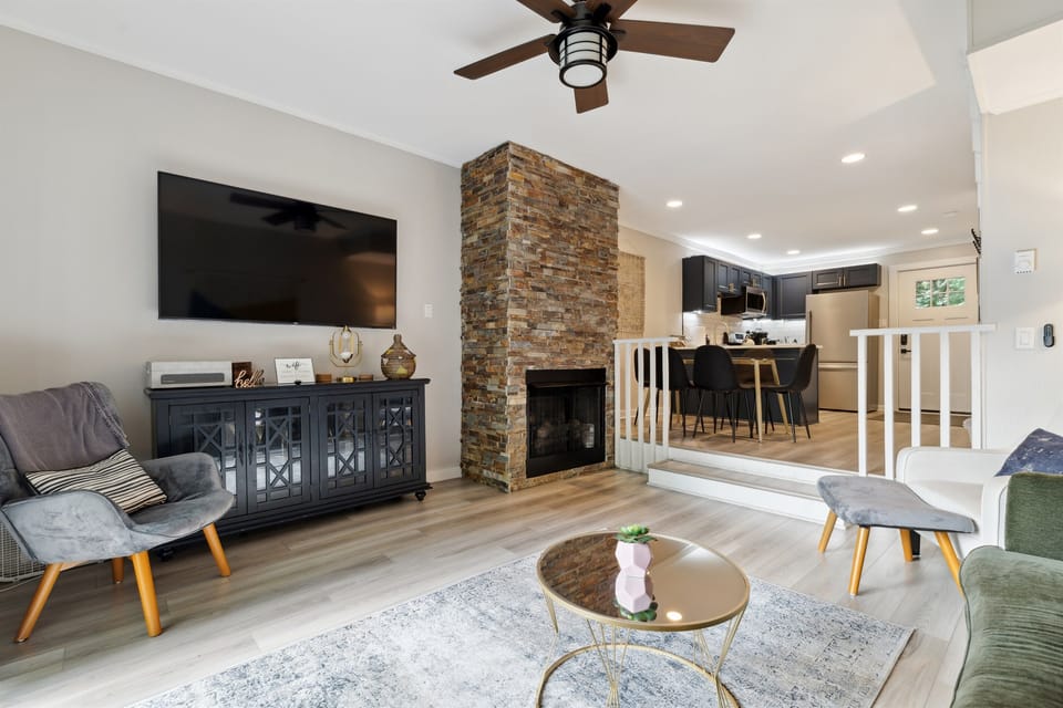 Enjoy the cozy living room with a gas fireplace and a Roku TV