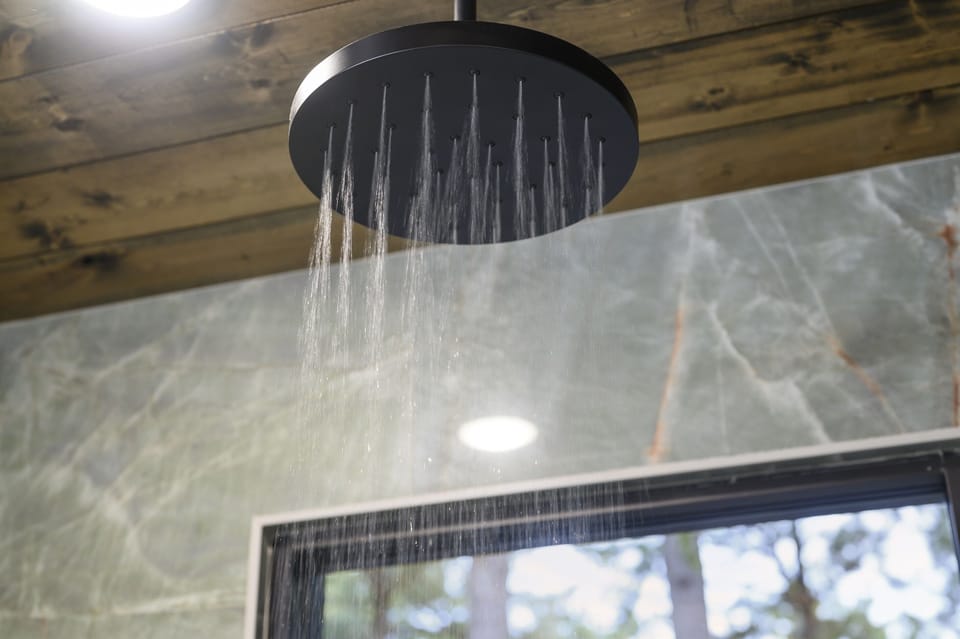 Rain showers in all bathrooms.