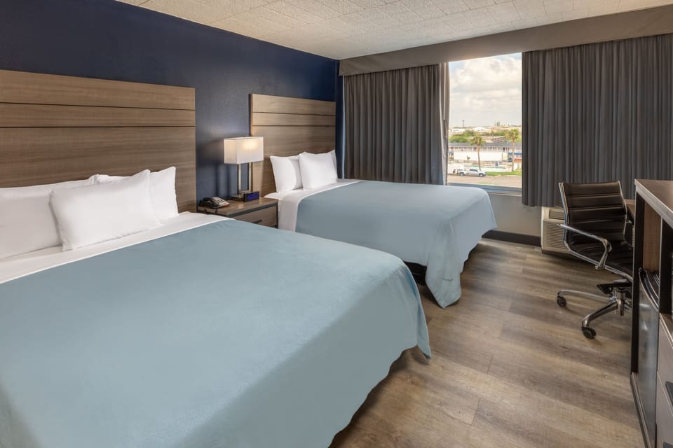 Room, 2 Queen Beds, Non Smoking | Blackout drapes, iron/ironing board, WiFi (free), bed sheets