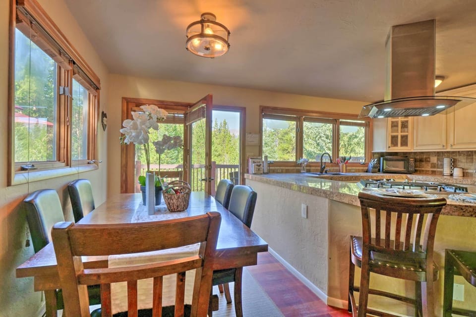 Dining room table next to open kitchen