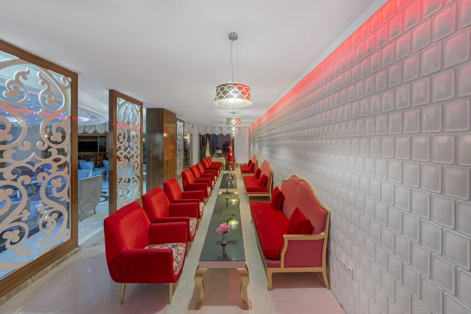 3 bars/lounges, poolside bar, beach bar
