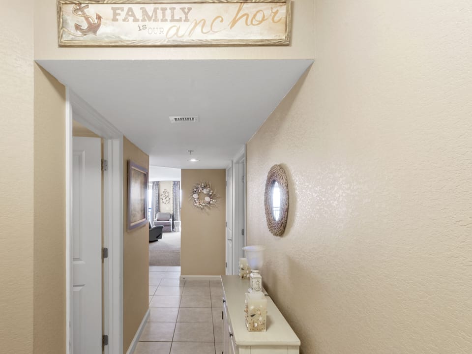 Your welcoming hallway features warm neutral tones and thoughtful touches, creating a cozy entrance to your home away from home.