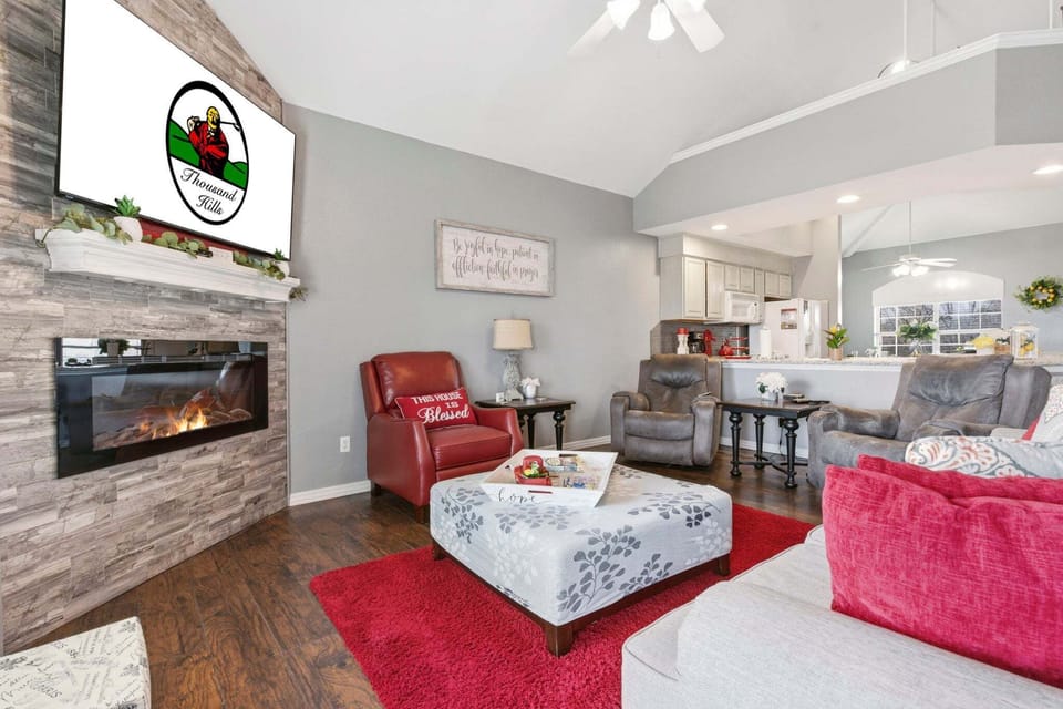 Living Area with Electric Fireplace, Cable TV, Sunroom Access