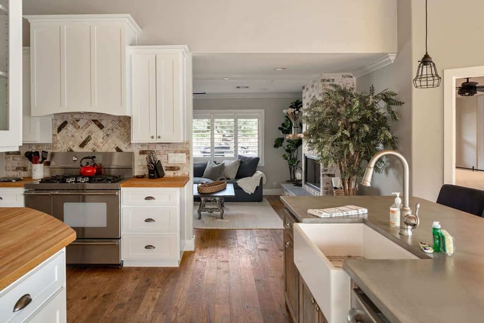 Great Chef's kitchen with farm sink and sit up counter.